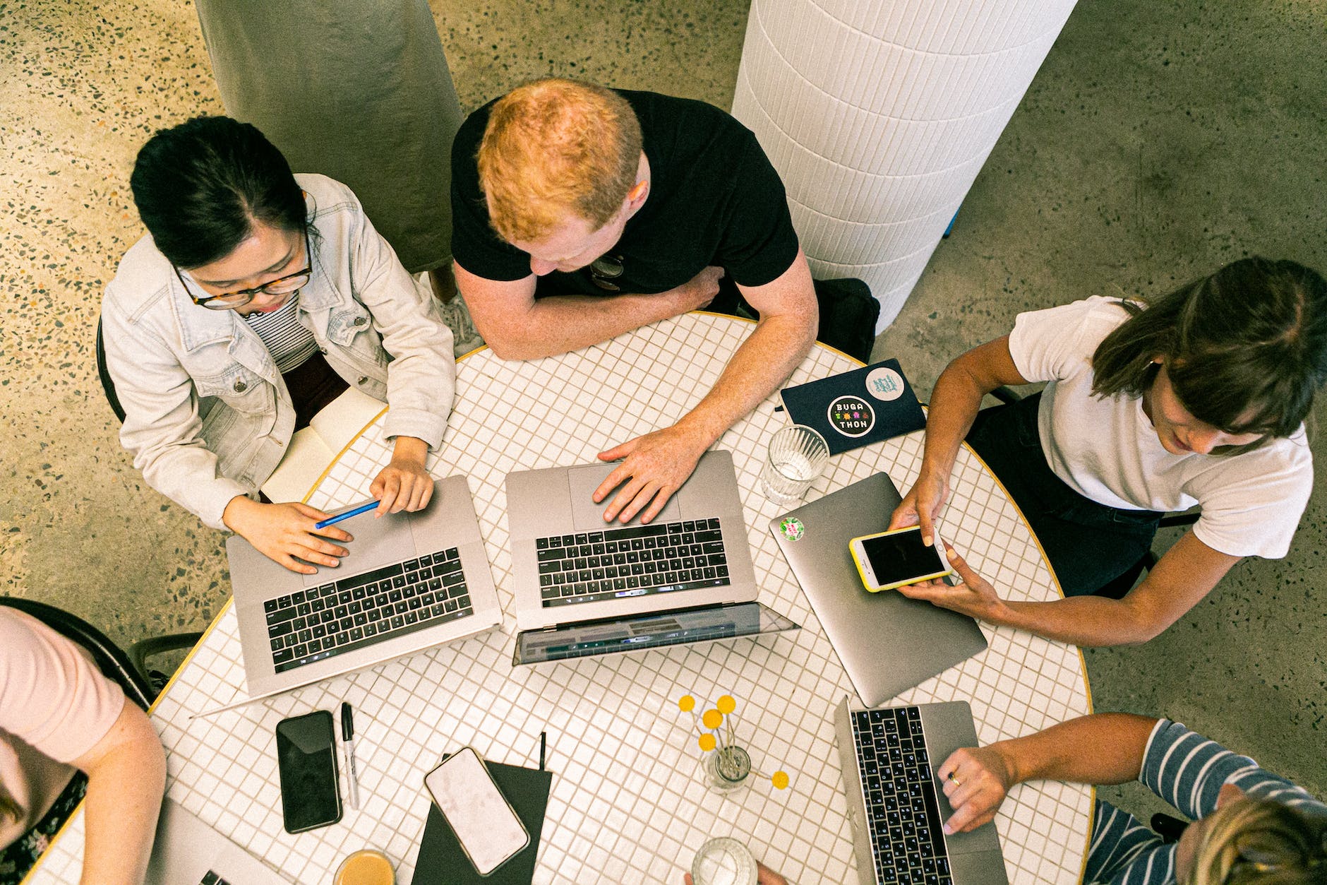 photo of people using laptops